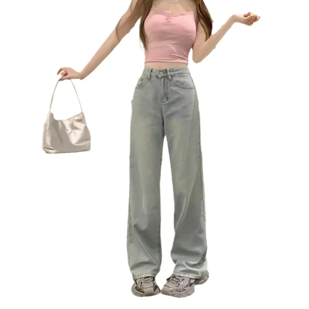 Jeans mit weitem Bein und aufgestickter rosa Schleife